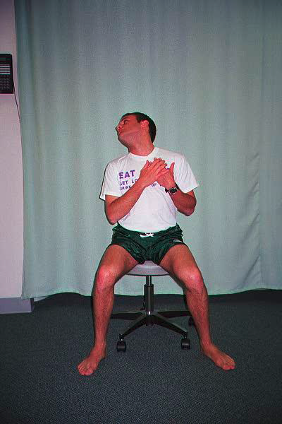 Dr. Ezgur performing Scalenes PIR / Self Stretch exersise