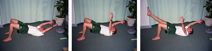 Dr. Ezgar performing Bridging exersise with arm and leg motion