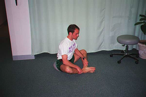 Dr. Ezgar performing Butterfly PIR / Self Stretch / CRS exersise